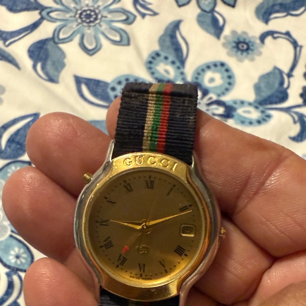 Gucci Men's Gold Dial Watch with Striped Strap